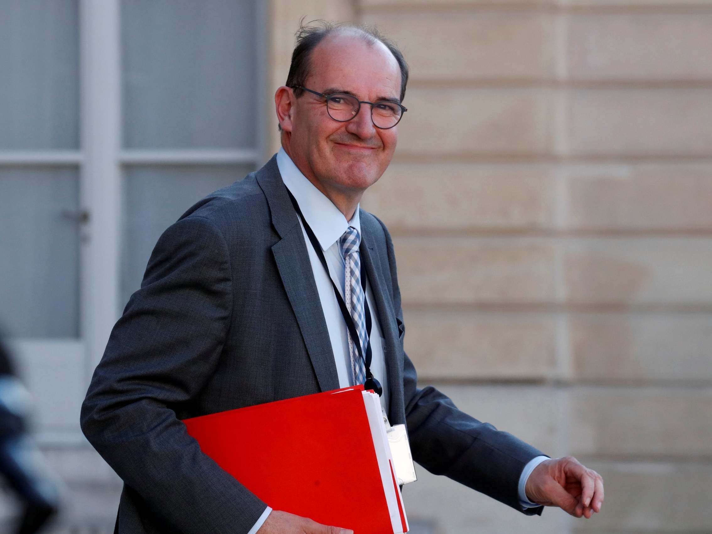 French government "deconfinement" coordinator Jean Castex leaves after a videoconference with the French president and French mayors at the Elysee Palace in Paris