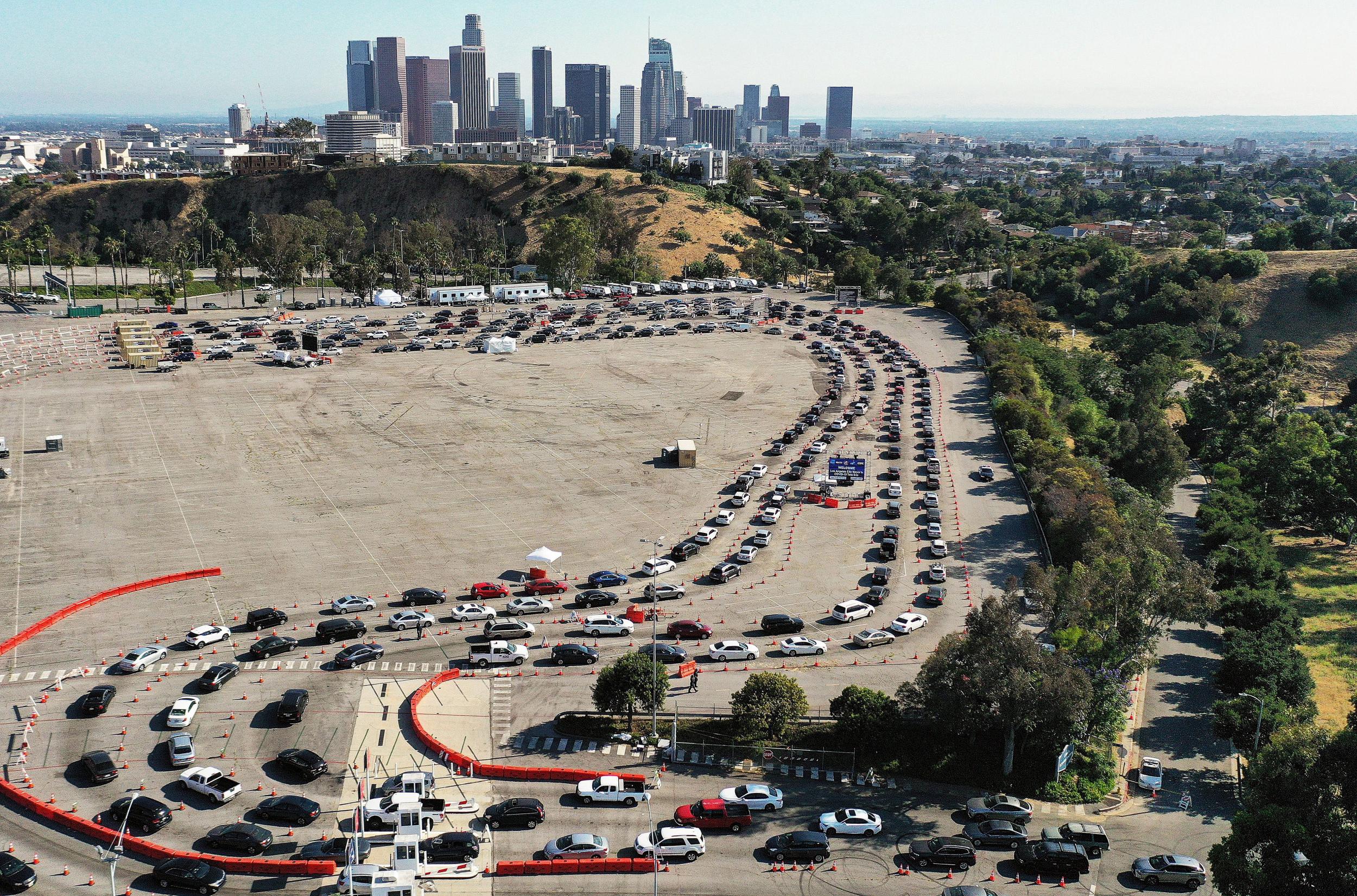 People queue up for Covid testing in LA, which has seen another huge surge in cases (Getty)