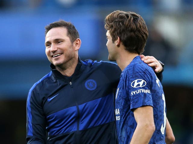 Chelsea coach Frank Lampard (left) with defender Marcos Alonso