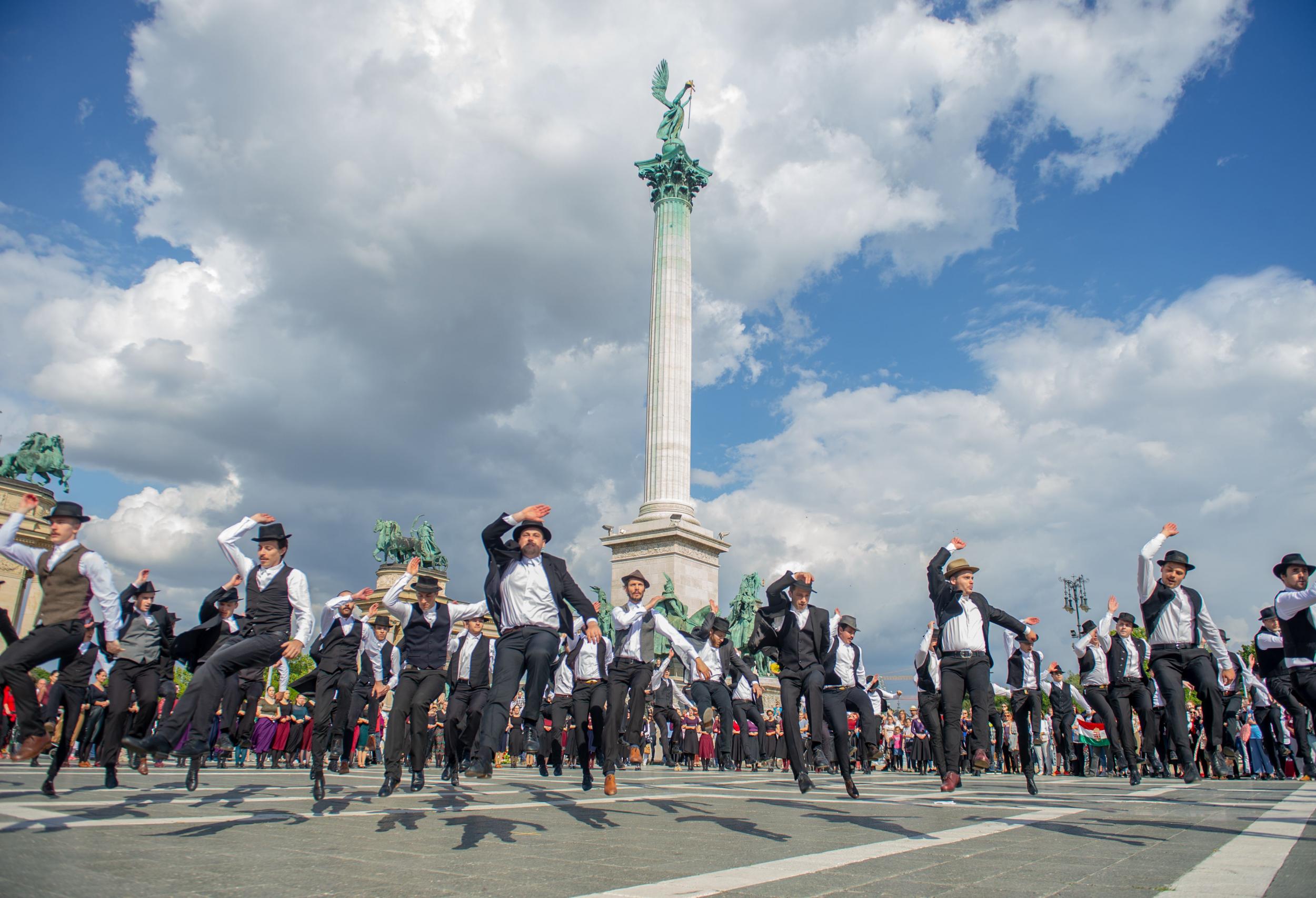 Folk dancers perform at a memorial event at Budapest’s Heroes Square to commemorate the 100th anniversary of the Treaty of Versailles