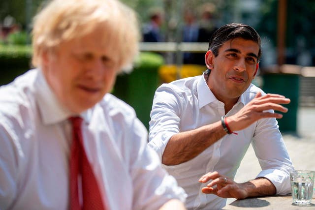 Rishi Sunak, right, visits Pizza Pilgrims restaurant in London with Boris Johnson.