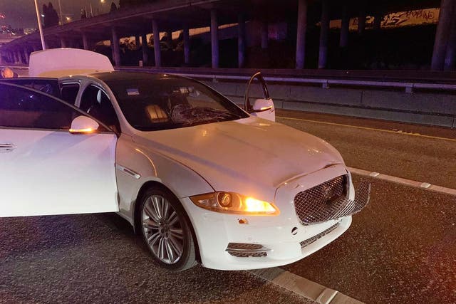 Early on 4 July, a photo shows the car of Dawit Kelete who is suspected of driving into a protest on Interstate 5 in Seattle. The city has been the site of prolonged unrest following the police killing of George Floyd in Minneapolis