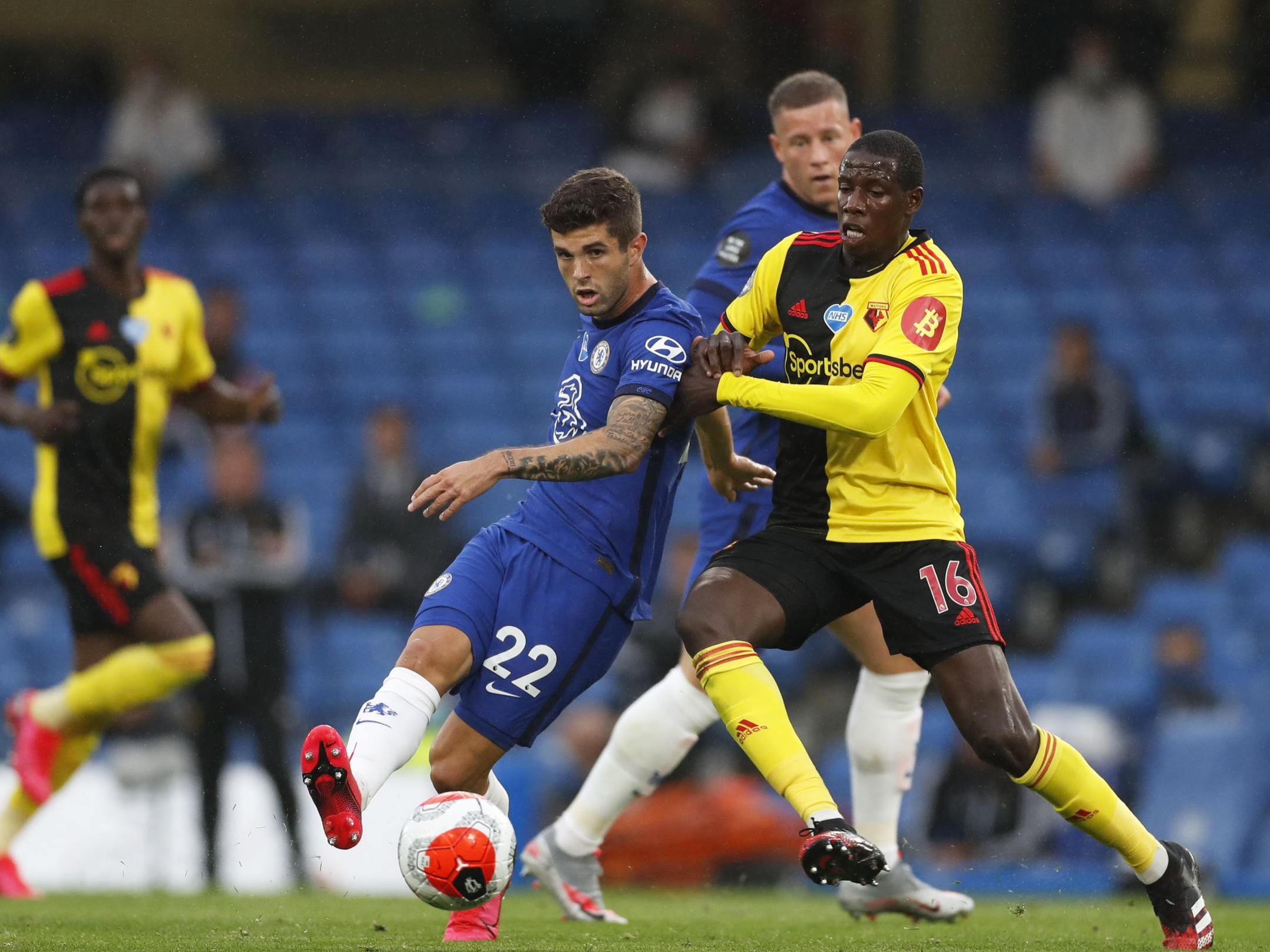 Pulisic dribbles past Doucoure