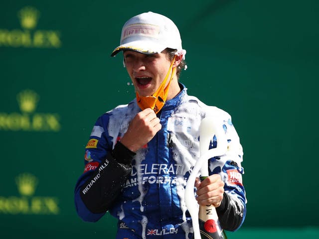 Lando Norris celebrates after finishing the Austrian Grand Prix in third