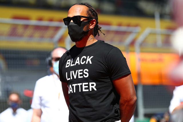 Lewis Hamilton wore a Black Lives Matter T-shirt and took a knee before the Austrian Grand Prix