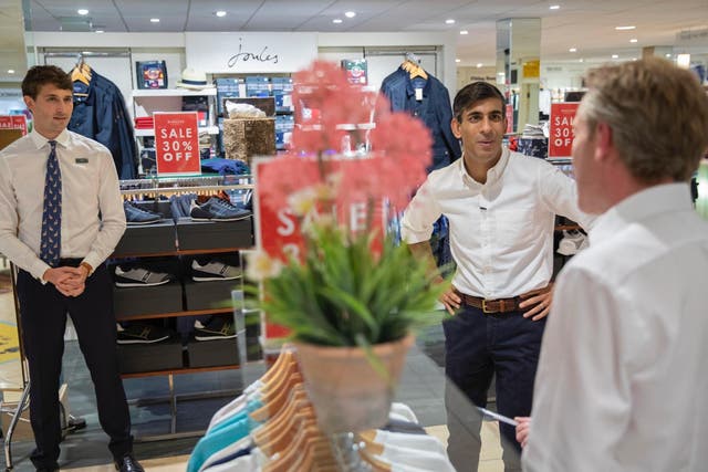 Chancellor Rishi Sunak speaking to shoppers. Can he persuade them to spend with his summer update?