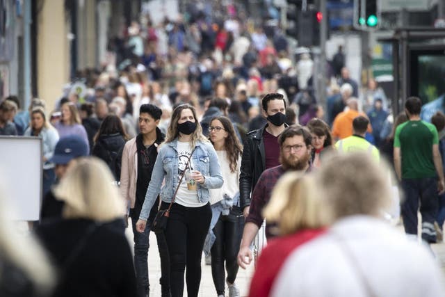 Shoppers wear protective face masks in Edinburgh's Princes Street