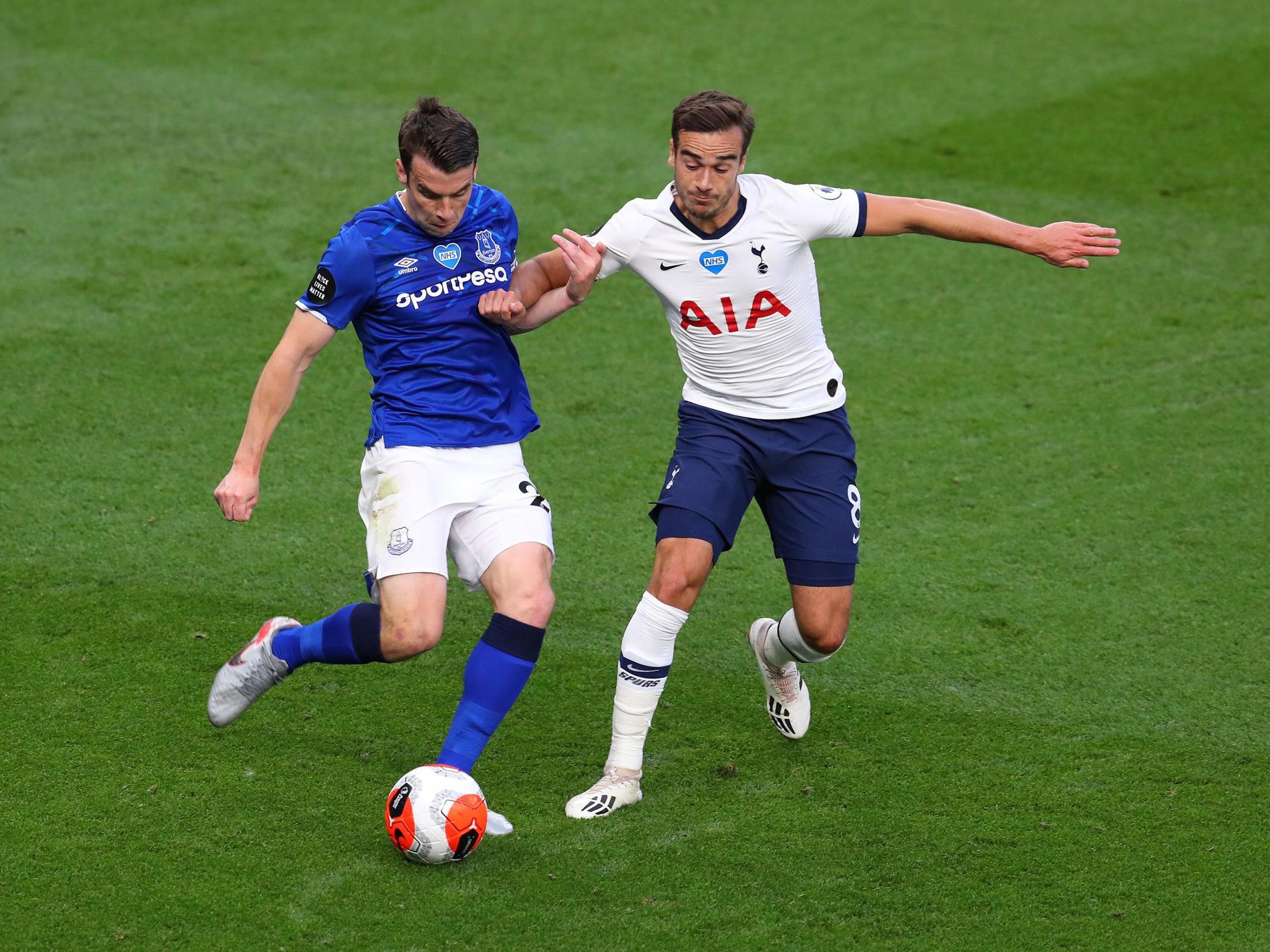 Seamus Coleman of Everton battles for possession with Harry Winks of Tottenham