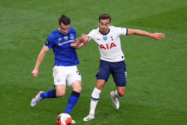 Seamus Coleman of Everton battles for possession with Harry Winks of Tottenham