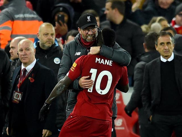 Jurgen Klopp manager of Liverpool celebrating with Sadio Mane