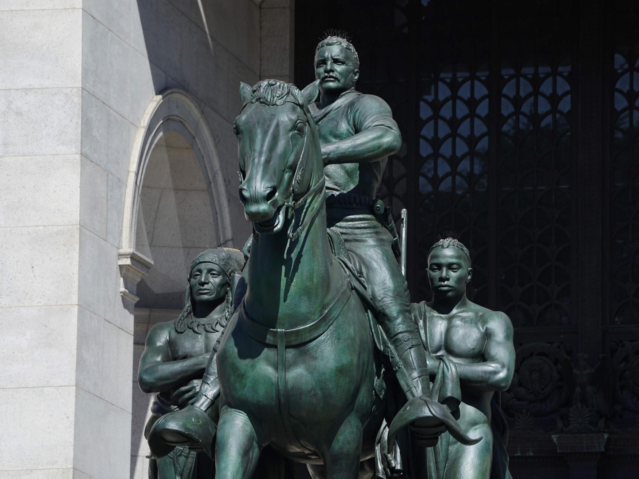 The statue of Roosevelt, at the entrance of the Natural History Museum in New York City, has long been the subject of calls for removal