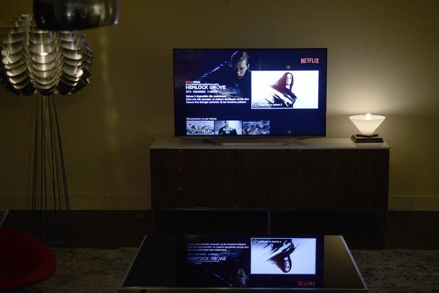 This photo shows a television screen displaying the French user interface of US online streaming giant Netflix, on September 15, 2014 in Paris