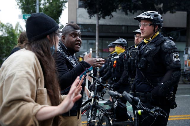 Police officers working to retake the Capitol Hill occupied protest area in Seattle last week