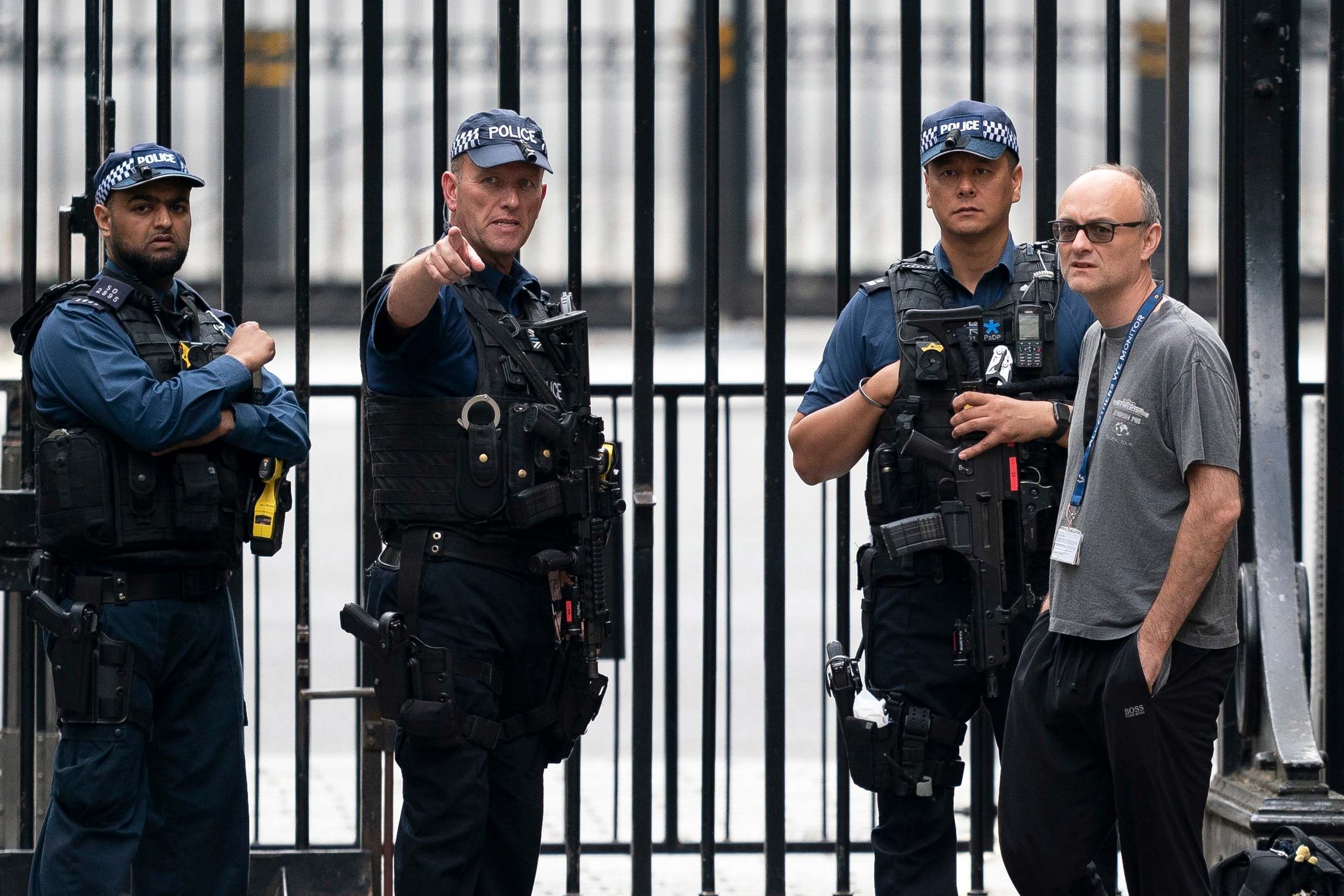 Dominic Cummings talks to police officers outside Downing Street