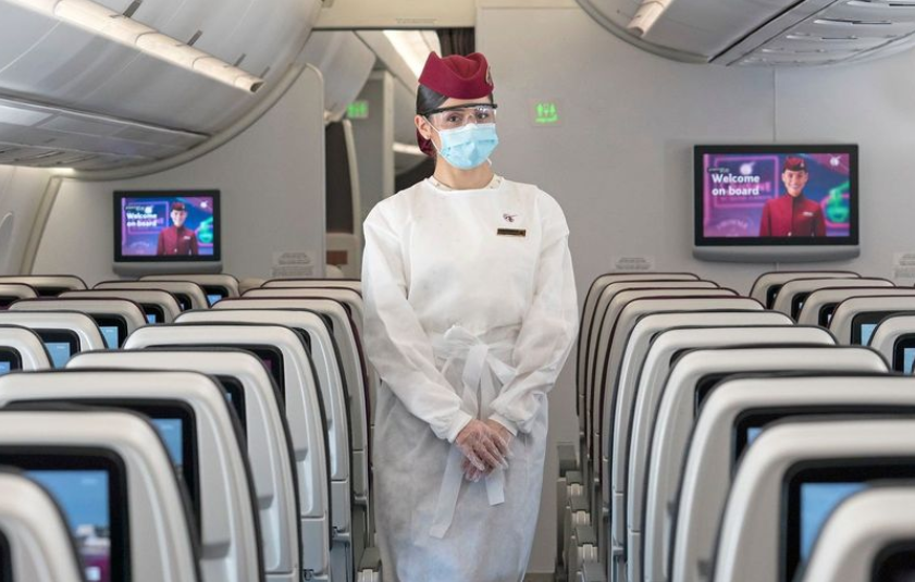 Qatar Airways cabin crew are kitted out in PPE