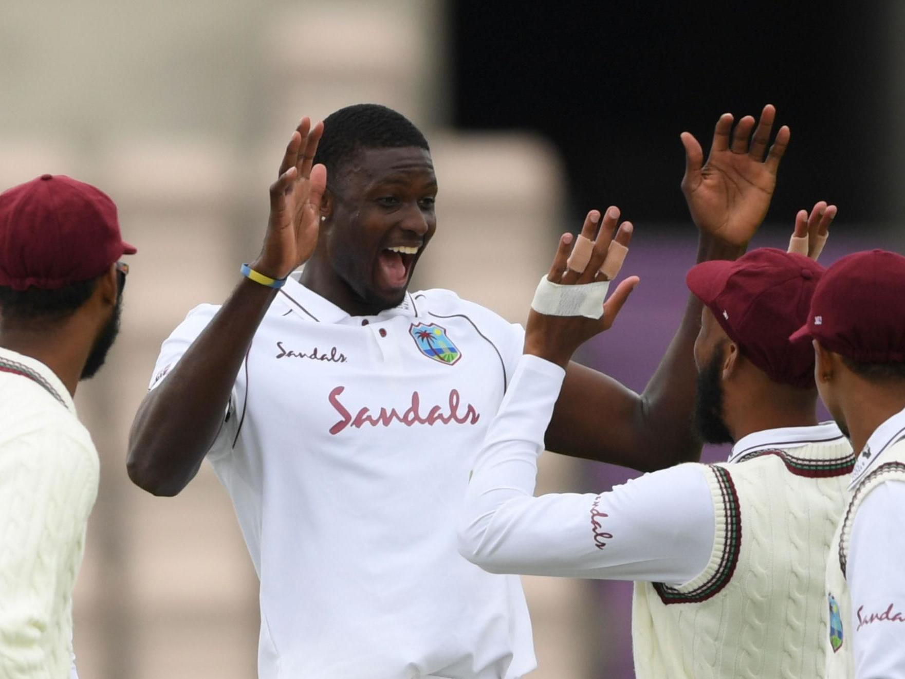 West Indies' Jason Holder celebrates taking the wicket of England's Jofra Archer