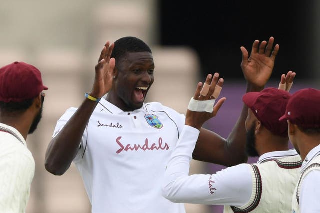 West Indies' Jason Holder celebrates taking the wicket of England's Jofra Archer