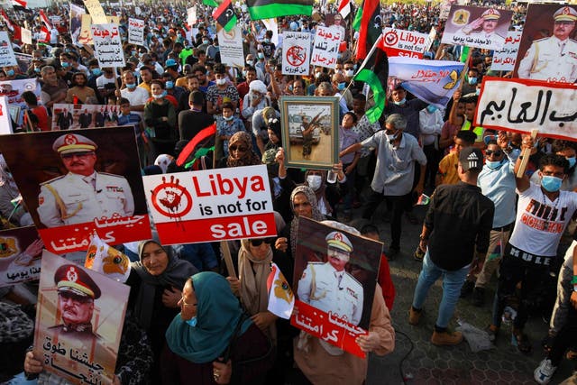 Supporters of Khalifa Haftar take part in a gathering in Benghazi this month