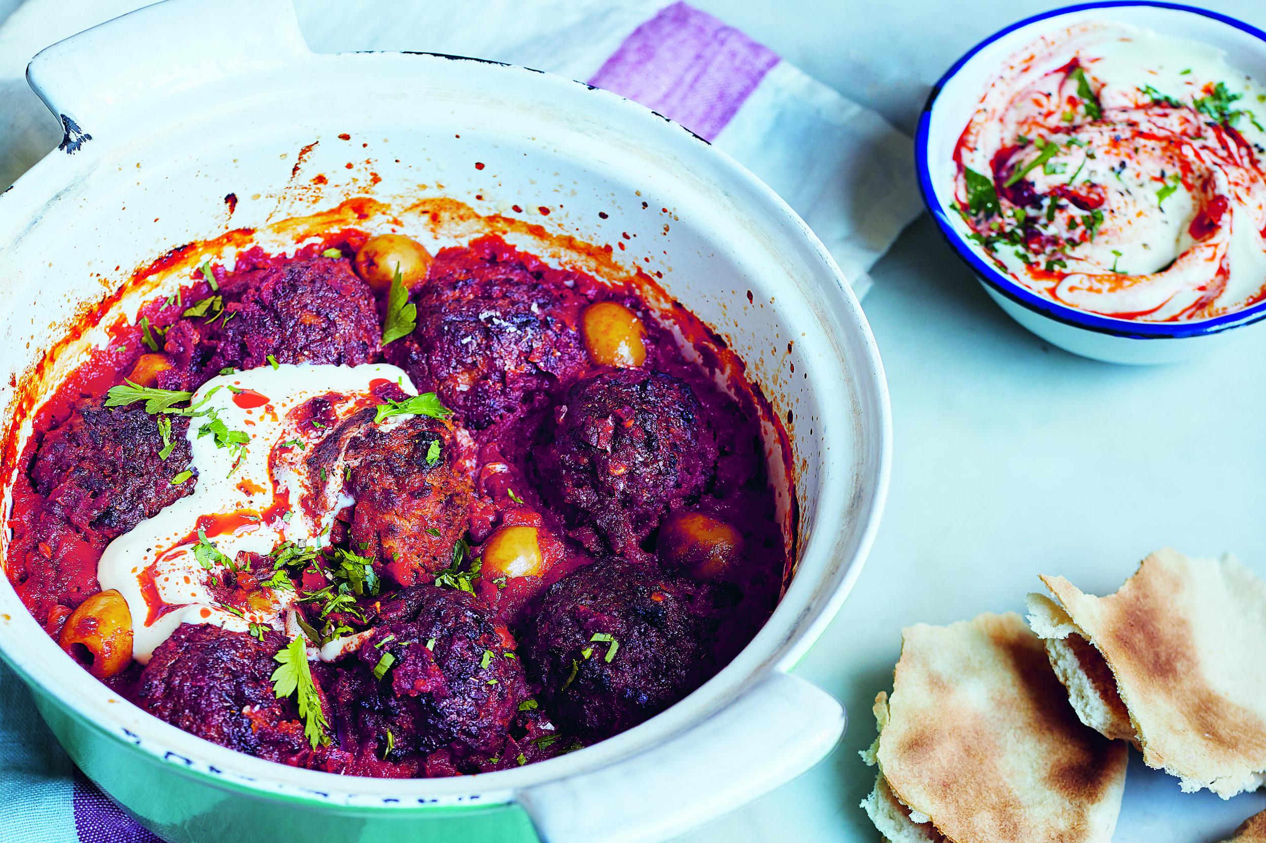 This one-pot baked harissa falafel recipe uses tinned tomatoes, ready-to-eat falafel, onions and olives