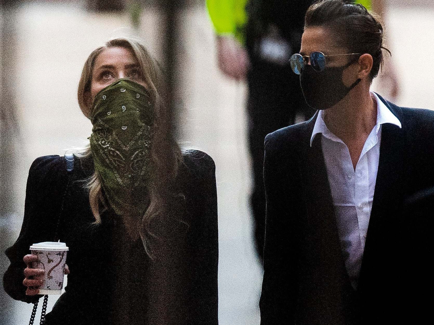 Actress Amber Heard with Bianca Butti (right) arriving at the High Court in London