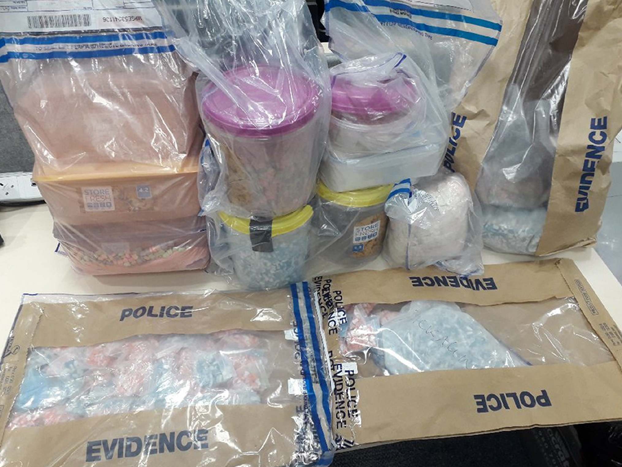 Police found several kilogrammes of crystal meth, MDMA and cocaine, 185,000 ecstasy pills and over 10,000 LSD tabs at Patrick Scotland's address