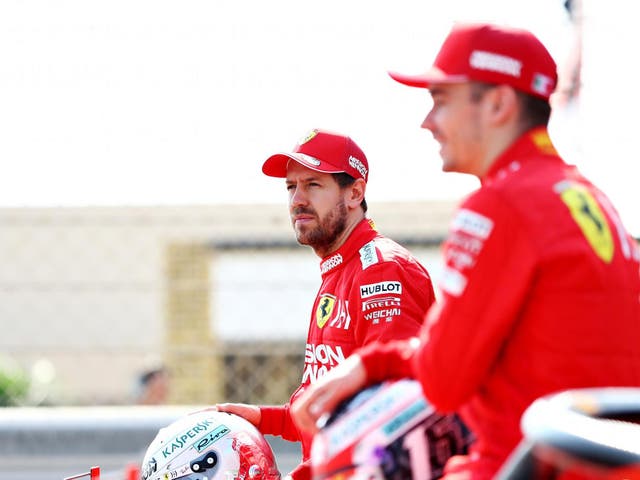 Ferrari's Sebastian Vettel (left) and Charles Leclerc