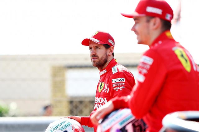 Ferrari's Sebastian Vettel (left) and Charles Leclerc