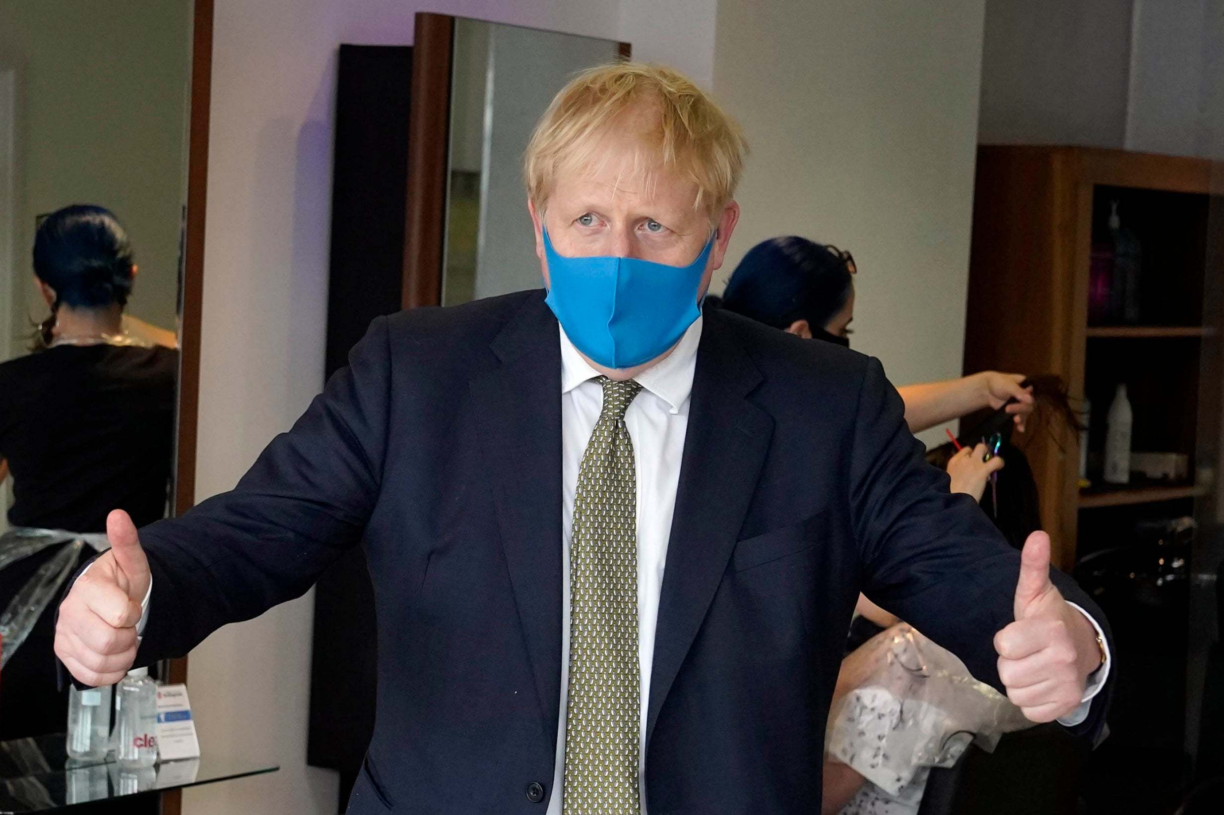 Boris Johnson was one of the last world leaders to be photographed wearing a mask in public