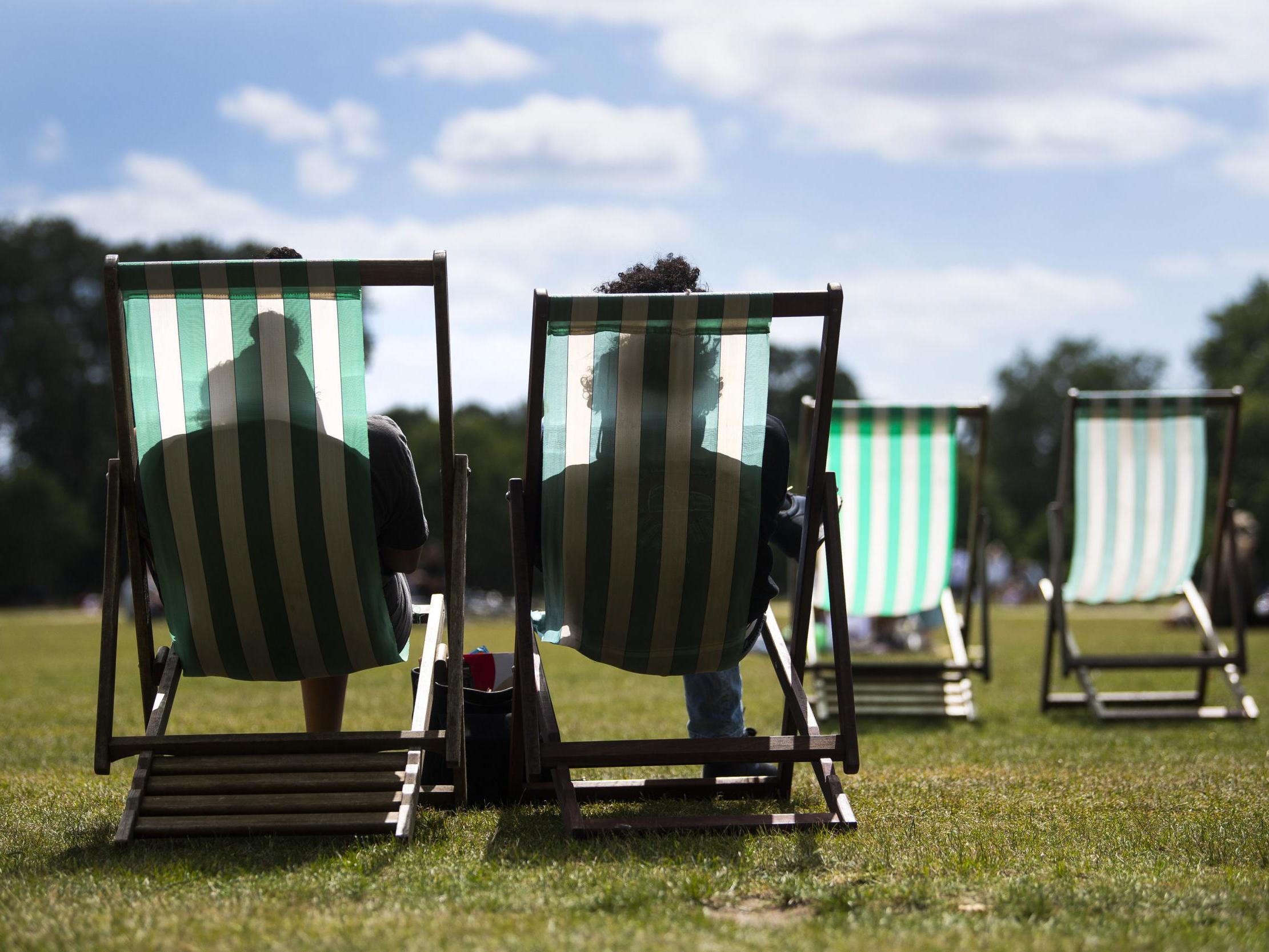 People enjoy the warm weather in Hyde Park, London, on 5 July, 2020.