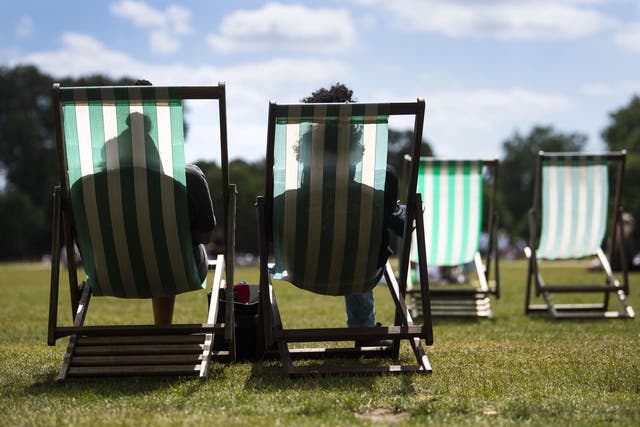 People enjoy the warm weather in Hyde Park, London, on 5 July, 2020.
