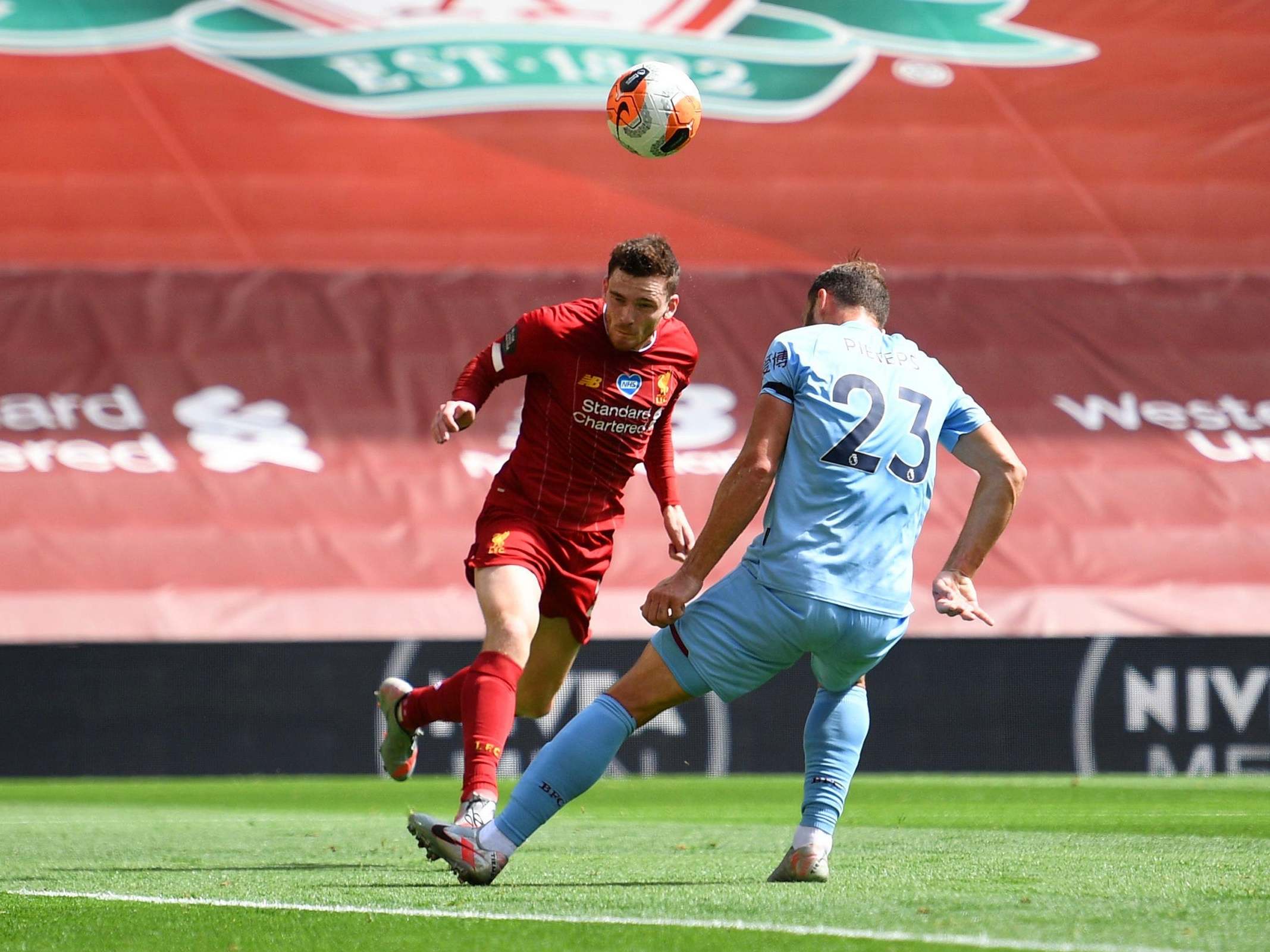 Andy Robertson heads in Liverpool's opening goal