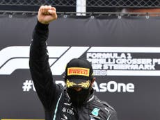 Hamilton gives black power salute on podium after winning Styrian GP