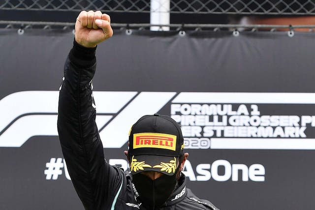 Lewis Hamilton gives the black power salute after winning the Styrian Grand Prix