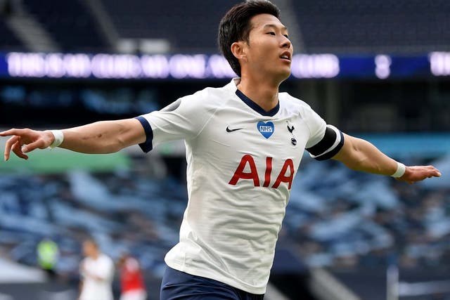 Tottenham's Son Heung-min celebrates after scoring his side's first goal against Arsenal