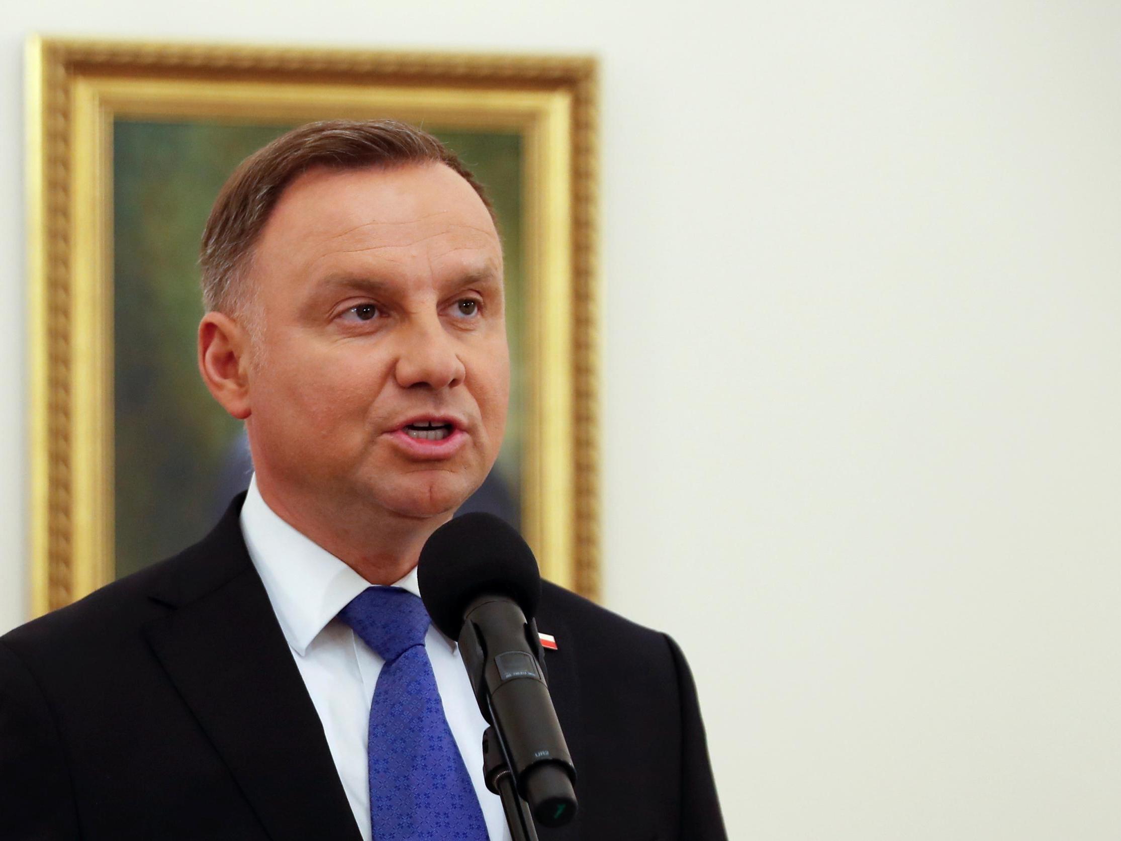 The incumbent president Andrzej Duda talks to the media in Warsaw, Poland, after the first exit polls were announced on 12 July, 2020.