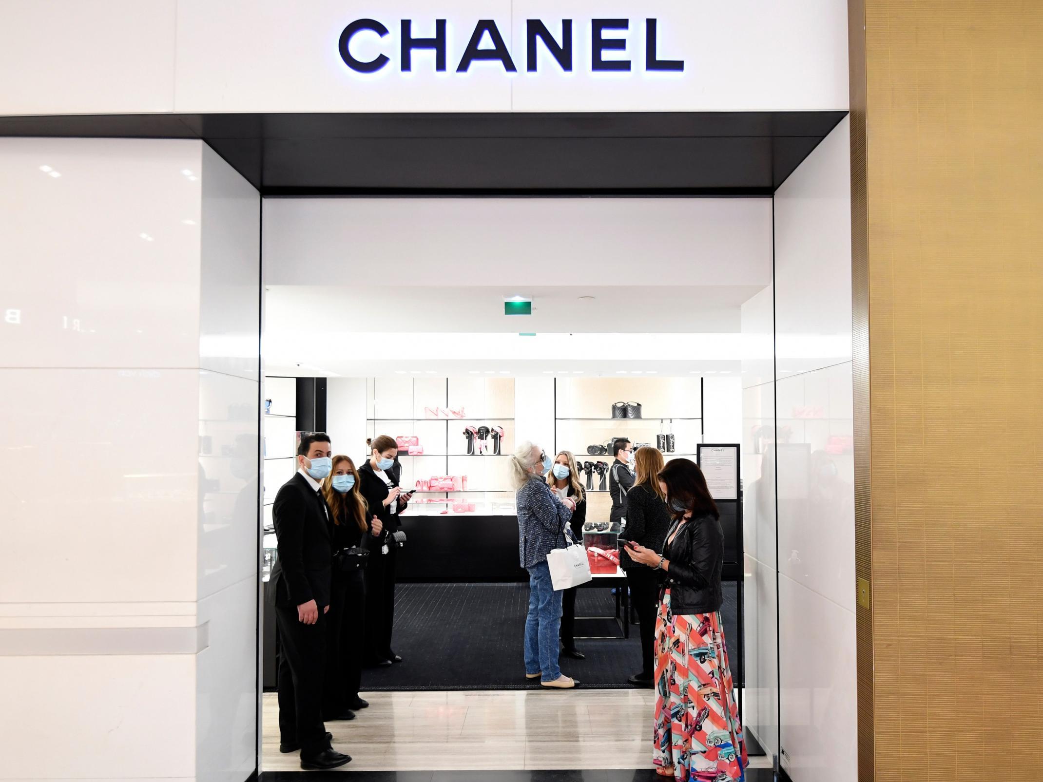 France is 'considering' widening face mask rules to include indoor shops, PM says