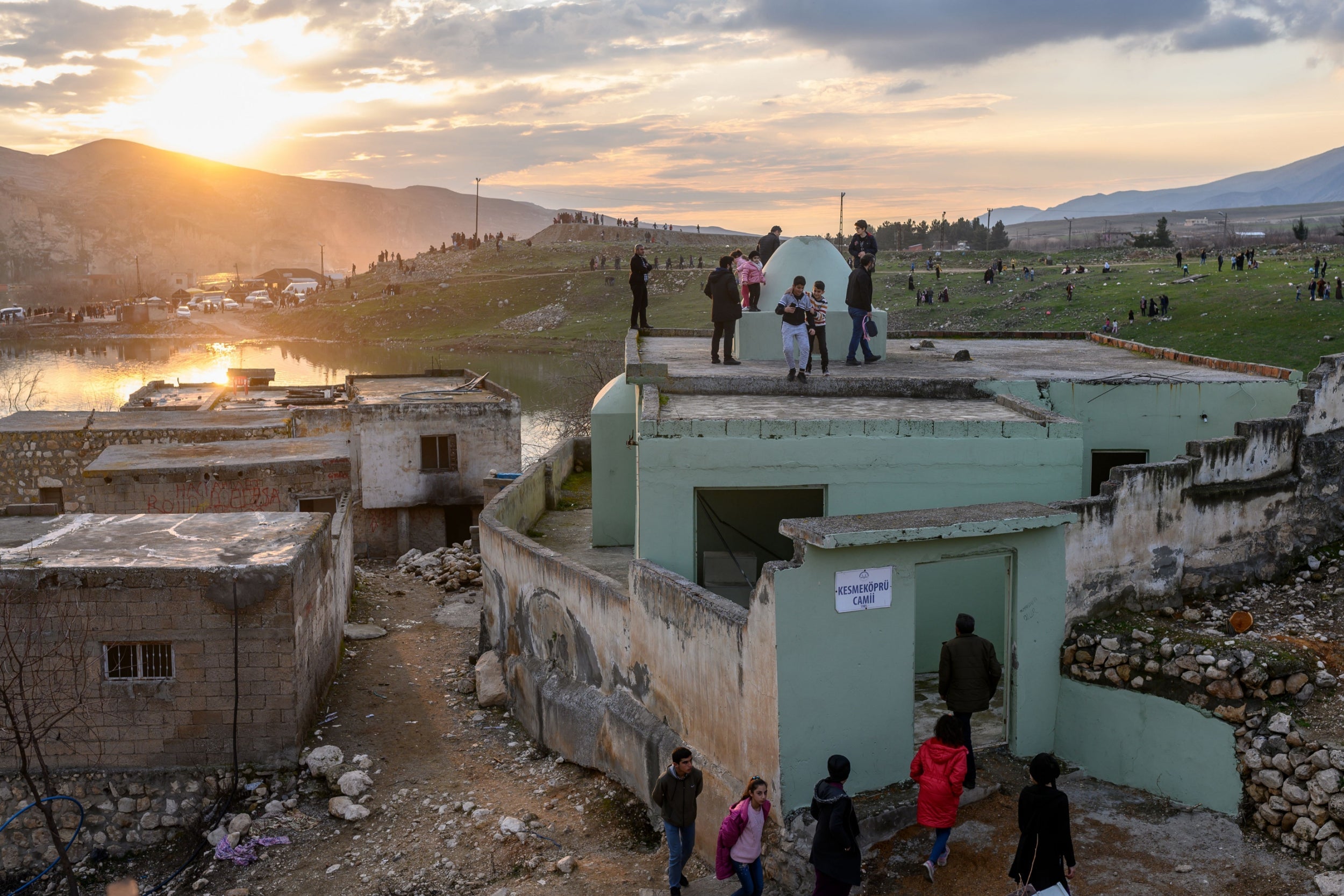Locals visit the abandoned houses of Hasankeyf before it is flooded (AFP/Getty)