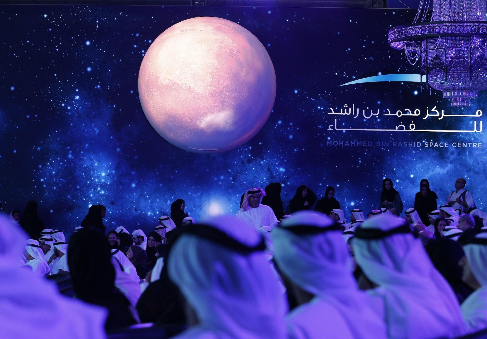 United Arab Emirates (UAE) officials, engineers and scientists take part in a ceremony to unveil UAE's Mars Mission on May 6, 2015 in Dubai