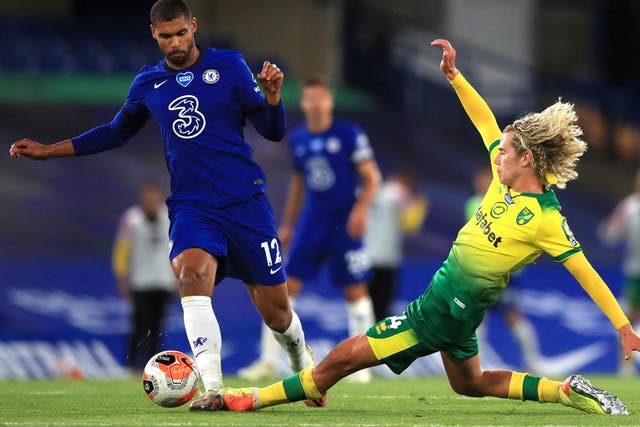 Todd Cantwell of Norwich City tackles Ruben Loftus-Cheek of Chelsea