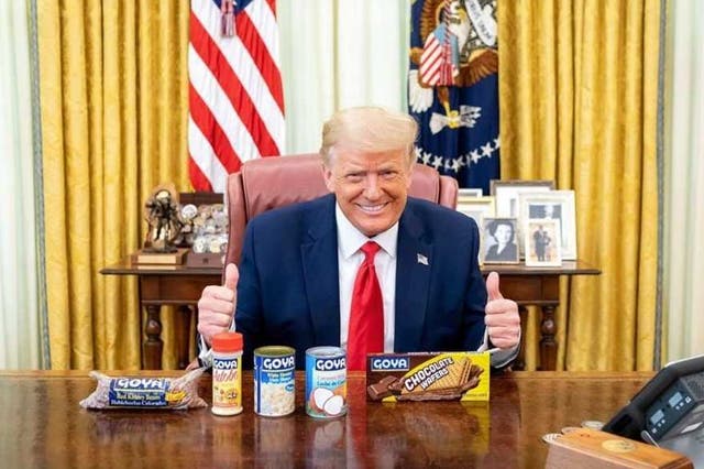 President Donald Trump posing with Goya Foods products on Wednesday