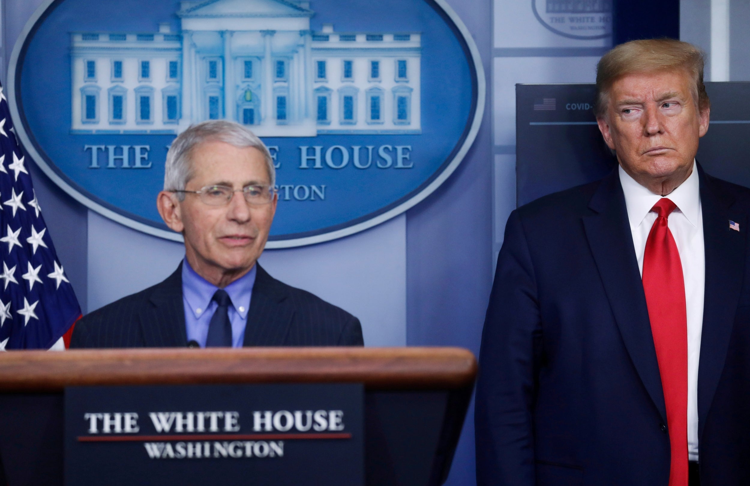 Donald Trump eyes Anthony Fauci during an April coronavirus briefing