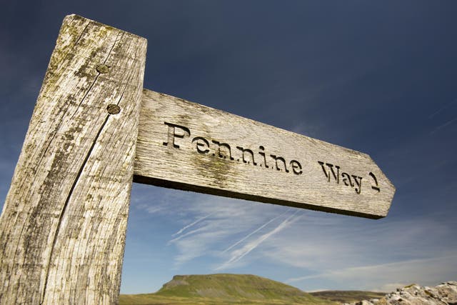 A Pennine Way signpost at Penyghent in the Yorkshire Dales, UK.