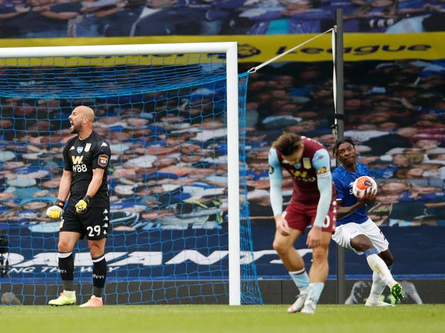 Pepe Reina, left, reacts as Aston Villa concede a late goal