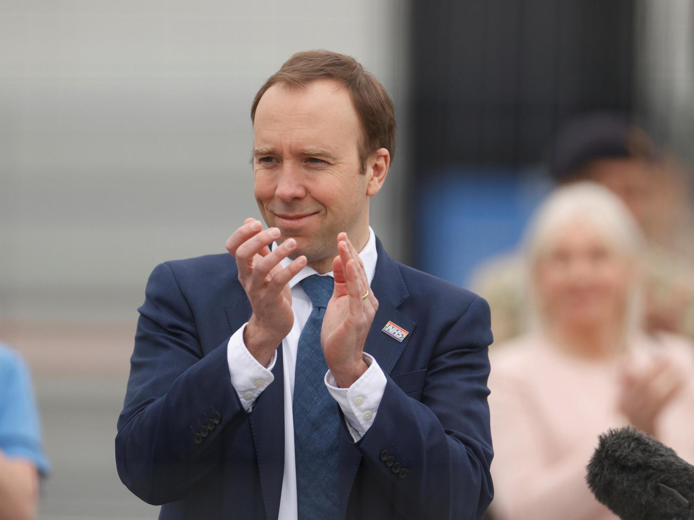 Matt Hancock applauds during the opening of the NHS Nightingale Hospital in April