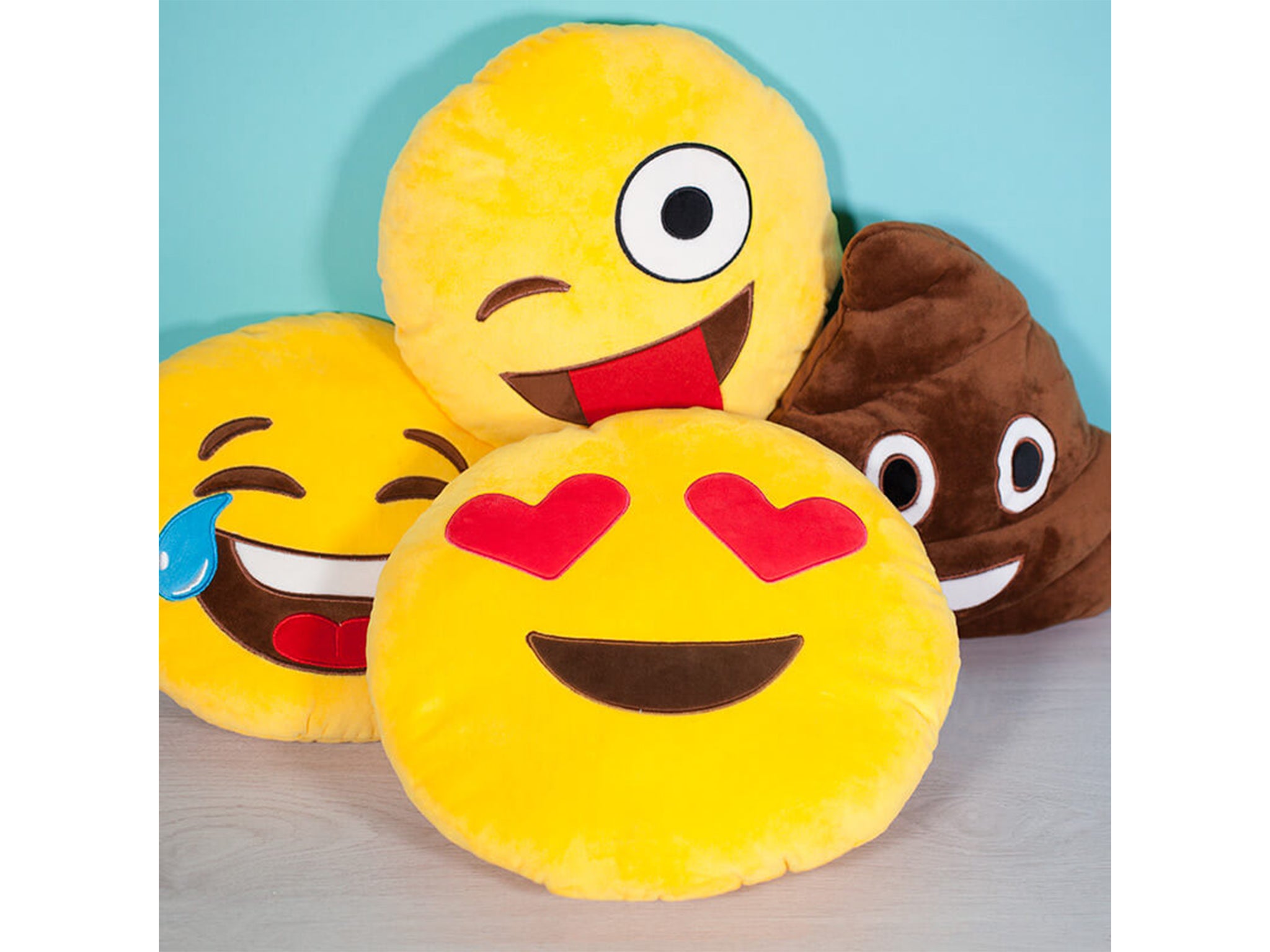 Show some love with this heart-eyed emoji cushion