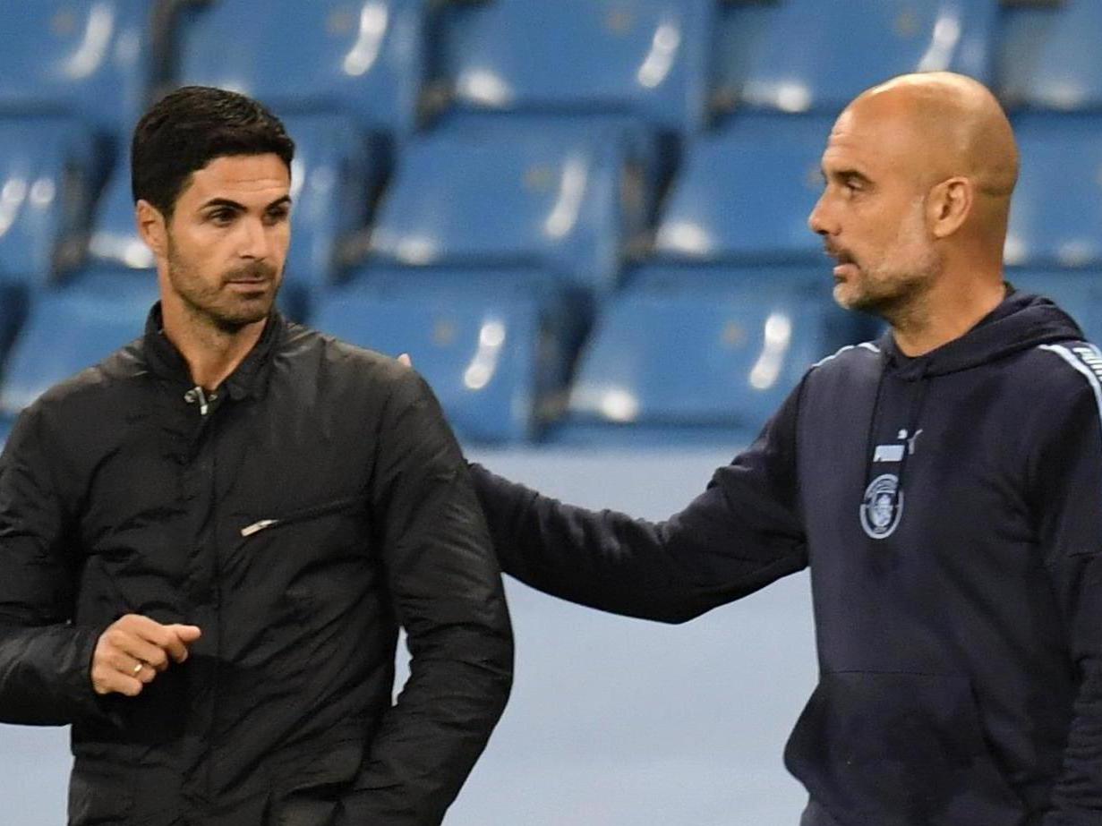 Manchester City manager Pep Guardiola (right) and Arsenal manager Mikel Arteta