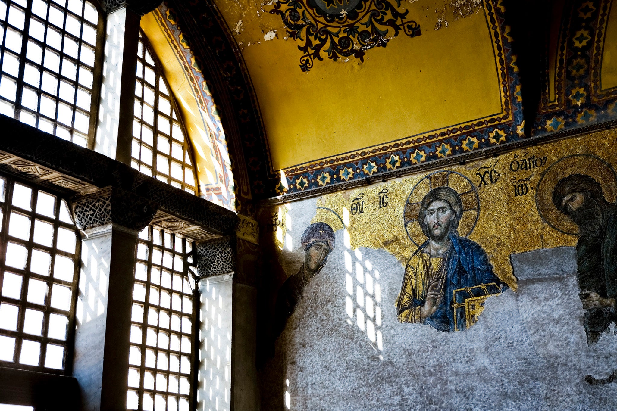 Mosaics featuring depictions of Christ were plastered over after the Ottoman conquest. They will be covered when prayers resume this week