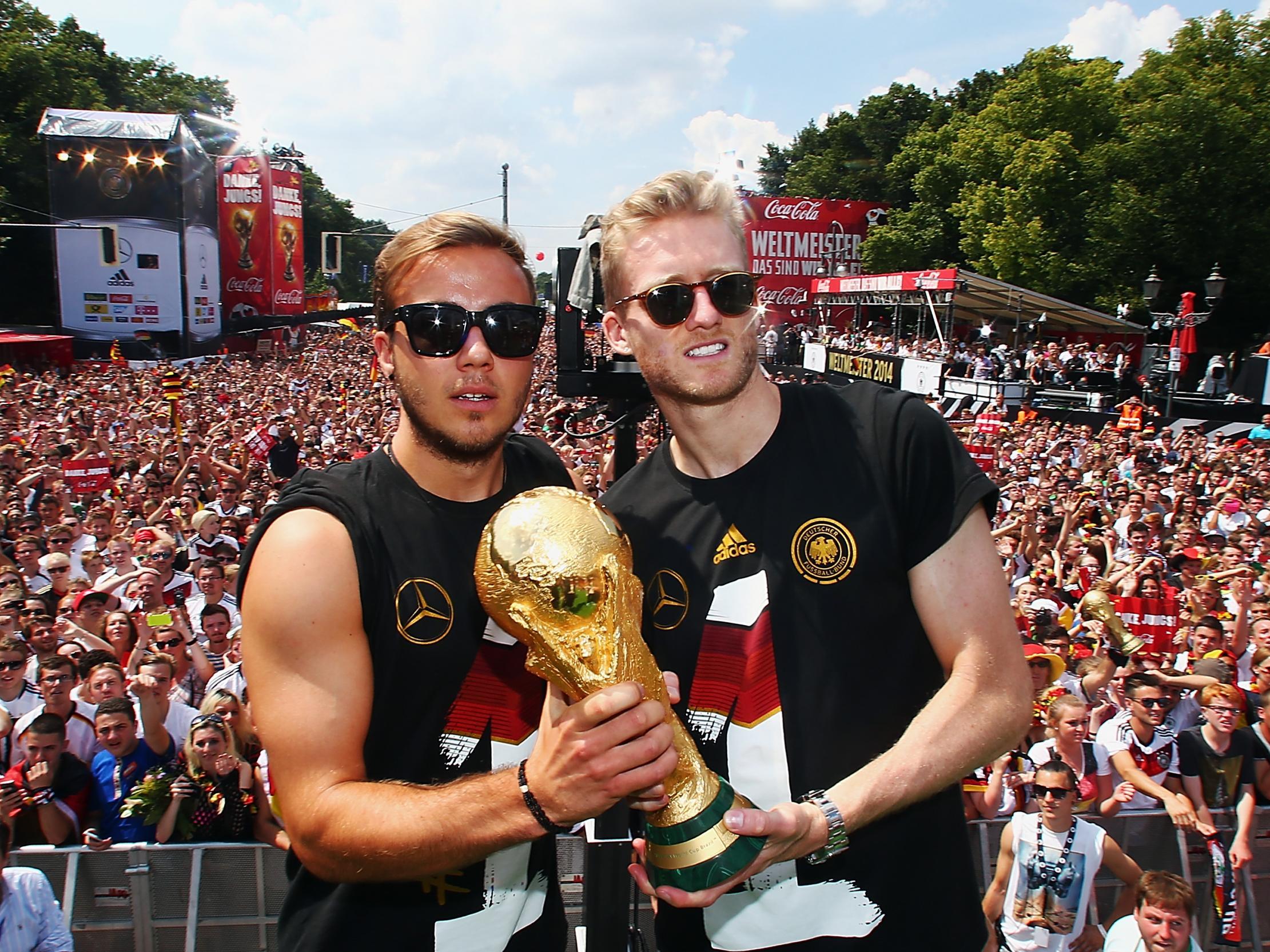 Andre Schurrle, right, with Mario Gotze and the World Cup