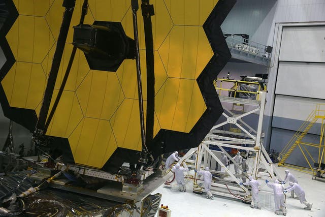 Engineers and technicians assemble the James Webb Space Telescope November 2, 2016 at NASA's Goddard Space Flight Center in Greenbelt, Maryland