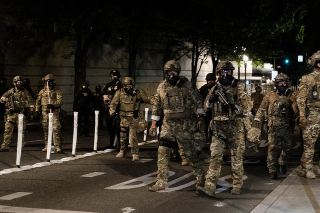 Federal officers prepare to disperse the crowd of protestors outside the Multnomah County Justice Center on July 17, 2020 in Portland, Oregon. Federal law enforcement agencies attempt to intervene as protests continue in Portland.